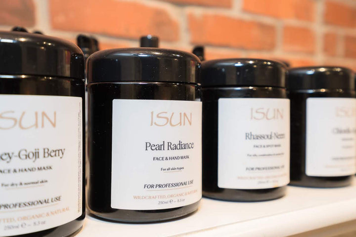 isun pearl radiance professional size tubs lined up on a shelf